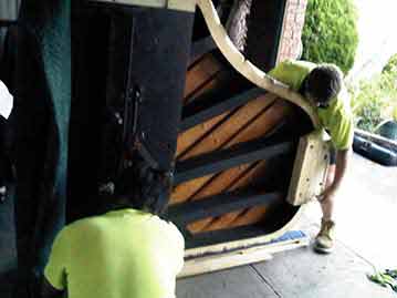 2 Piano Removalists Moving a Grand Piano